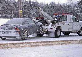 Photo of car being towed