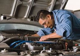 Mechanic working on car