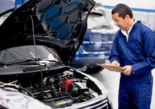 Mechanic working on car