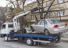 Photo of car being towed