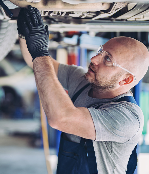 Mechanic working in auto repair shop